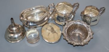 A silver cream jug and sugar bowl(a.f.), one other silver cream jug, a pair of silver bonbon