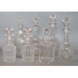 A collection of seven cut glass decanters