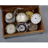 Assorted pocket watches and wrist watch movements, housed in a plated cigarette case.
