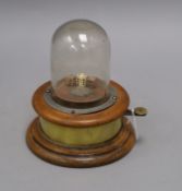 A rare Victorian 'dice shaker' with original glass dome