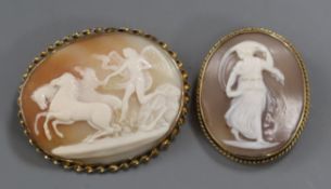 Two yellow metal mounted oval cameo brooches, largest 55mm.