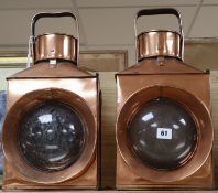 A pair of early 20th century copper railway lamps H.46cm