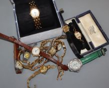 A small group of assorted lady's wrist watches and a watch dial bearing the inscription 'Rolex'.