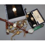 A small group of assorted lady's wrist watches and a watch dial bearing the inscription 'Rolex'.