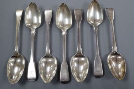 Six assorted George III silver fiddle pattern tablespoons and one George III silver Old English