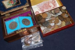 A collection of coins, including two George III crowns, a George II shilling, various Georgian