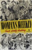 A Womans Weekly tin advertising sign