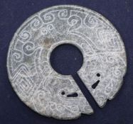 A Chinese stone huang disc