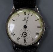 A gentleman's early 1940's Omega manual wind wrist watch, with Roman dial and subsidiary seconds, on