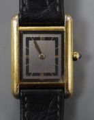 A lady's gilt white metal Cartier Vermeil Tank quartz wrist watch.