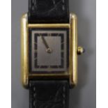 A lady's gilt white metal Cartier Vermeil Tank quartz wrist watch.