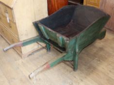 A wooden wheelbarrow W.62cm
