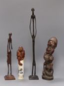 A Japanese carved wood and bone box and three items of tribal carving and statues (4)