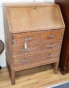 A small Heals limed oak bureau W.70cm