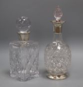 Two silver mounted cut glass decanters largest 30cm