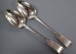 A pair of Victorian Irish silver fiddle pattern basting spoons, William Cummins, Dublin, 1845,