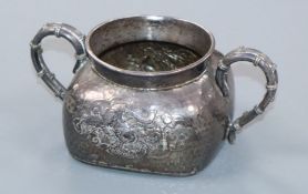 A Japanese planished white metal two handled sugar bowl, width 11.8cm.