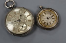 A Victorian silver pocket watch and an 800 white metal fob watch.