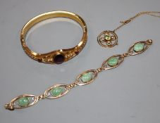 An early 20th century yellow metal, peridot and seed pearl pendant on chain, a 9ct gold and green