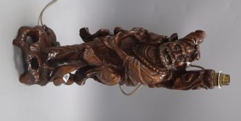 A Chinese carved hardwood figural carving height 48cm