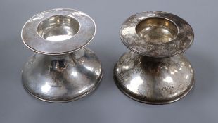 A pair of 1930's silver pedestal table salts? William Comyns & Sons Ltd, London, 1938, height