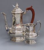 A George V silver bachelor's coffee pot and matching cream jug, Mappin & Webb, Sheffield, 1933, 21