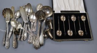 A group of small silver flatware including a Victorian sifter spoon, christening pair etc and a pair