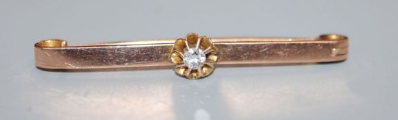 A 9ct gold and solitaire diamond set tie pin, 50mm.