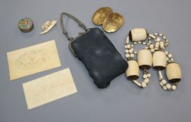 A group of ivory carvings, Japanese gilt metal buckle etc.