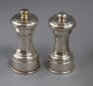 A pair of modern silver mounted salt and pepper mills, Langfords Silver Galleries, London, 1997,