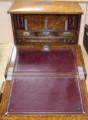 A late Victorian oak stationery box