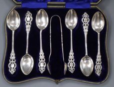 A cased set of six Edwardian silver teaspoons and pair of sugar tongs.