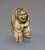 A 19th century Japanese ivory oni netsuke 5.5cm