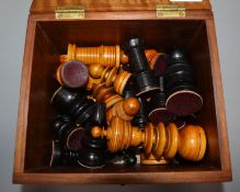 A St. George style stained and natural boxwood chess set