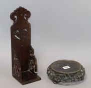 A Chinese bronze stand and a Chinese wooden stand