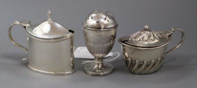A Victorian silver pedestal pepperette by Charles Stuart Harris, London, 1883 and two Victorian