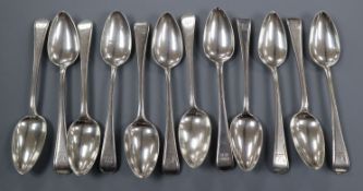 Twelve assorted early 19th century and later silver Old English thread pattern dessert spoons, 15