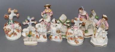 Ten Staffordshire small porcelain pastoral groups, c.1830-50, attributed to Dudson, including