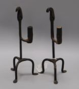 A pair of 18th century wrought iron rush lights height 32cm