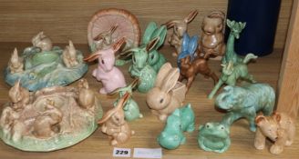 A collection of various Sylvac animals with a collection of similar rabbits