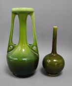 A tall Bretby Arts & Crafts green glazed vase and a similar Sarreguemines bottle vase tallest 33.