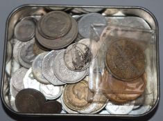 A collection of UK pennies and other coins