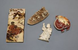 A Japanese ivory card case and three other carvings