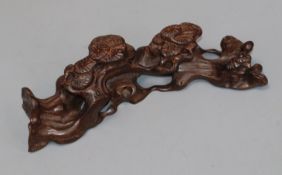 A Chinese hardwood 'pin' brush rest length 20cm