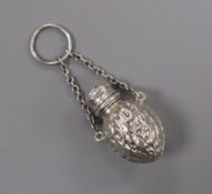 A late 19th/early 20th century novelty white metal scent flask, modelled as a walnut, unmarked, with