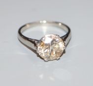 A white metal and solitaire diamond ring, the stone weighing 2.55cts, with an approximate colour and