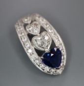 A modern 18ct, sapphire and diamond set pendant with four graduated heart motifs, 17mm.