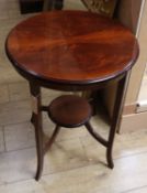 A mahogany circular two tier table W.55cm