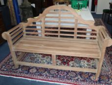 A Lutyens style garden bench W.165cm