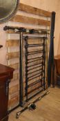 A Victorian tubular brass and iron double-sized bedstead W.140cm